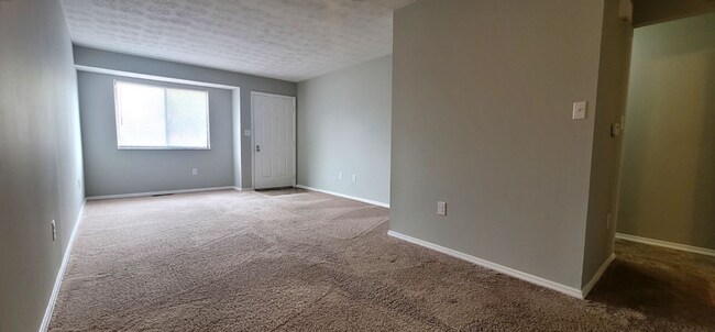 Building Photo - Cozy 2 bed 1.5 Bath Condo With Car Port