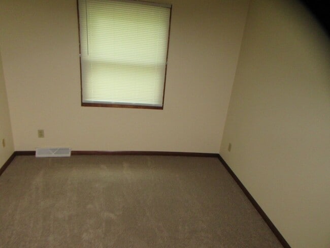 Building Photo - Spacious 3BD/1.5BA with Attached Garage and Backyard! - Available 4/1/2026