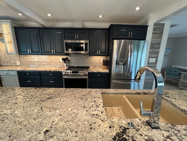 Building Photo - Furnished ** Punta Gorda Isles Vacation Home ** Heated Pool ** Canal / Boat Dock ** $6,500