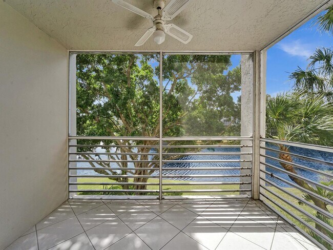 Building Photo - 9420 Poinciana Plz