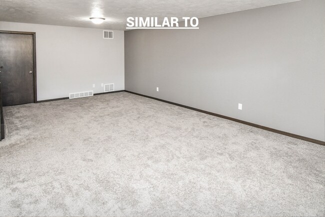 Building Photo - East Sioux Falls 4-Bedroom Townhome – Style, Space & Convenience!