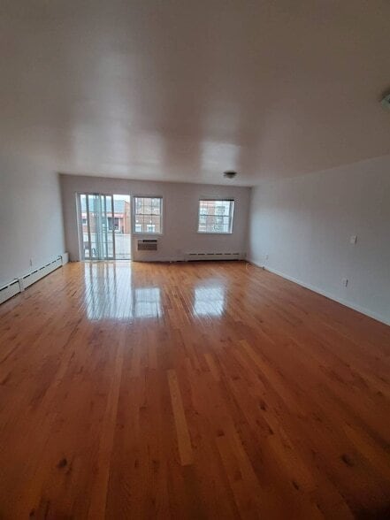 Building Photo - 48-49 47th Street Unit