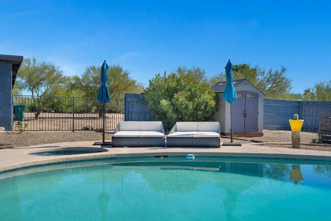 Building Photo - 6240 E River Rd