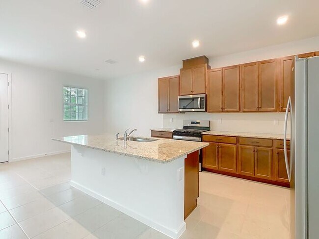 Building Photo - New Luxury Townhome in Celebration, FL Corner unit. All porcelain tiled floors. Aleutian model by...