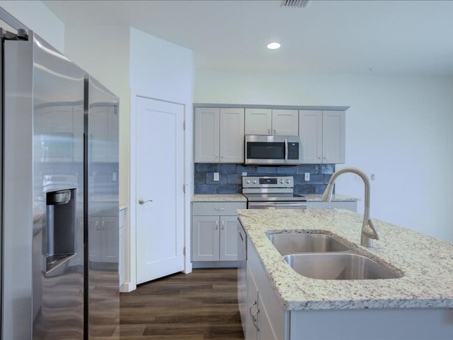 Building Photo - Stylish Two-Story Living with Modern Comforts!