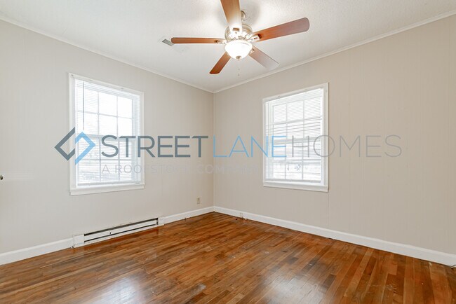 Building Photo - REDUCED! - NOW OFFERING HALF OFF FIRST FUL...