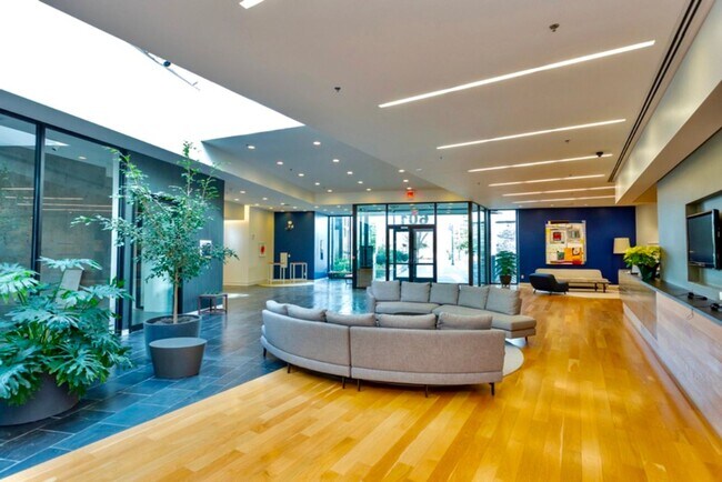 Building Photo - Effortless Downtown Living in the Heart of...