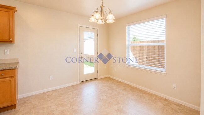 Building Photo - Spacious Home with Fenced Backyard!