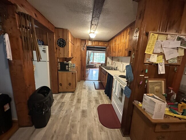 Building Photo - Charming 3BR Waterfront Retreat with Sunroom, Brick Accent & Scenic Lake Views
