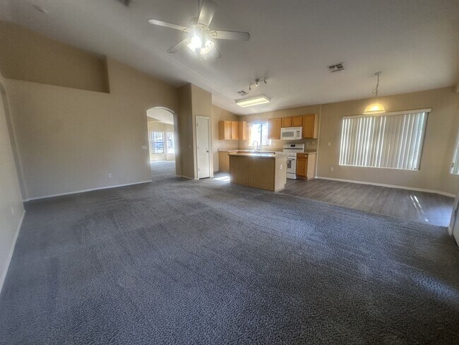 Building Photo - Rare single-level home offers 5 bedrooms and a versatile floor plan designed for comfortable living