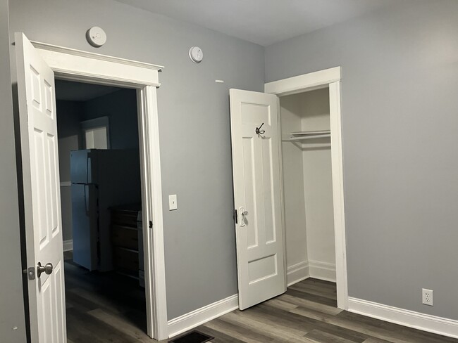 Doors to kitchen and closet in back bedroom - 256 Weyl St