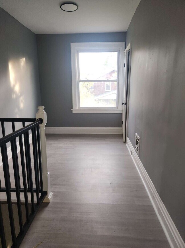 Building Photo - Charming & Spacious Updated Brick Home – P...