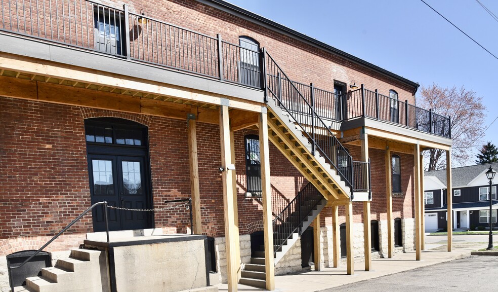 Second floor is 3-apartments, 1st floor is commercial space used by owners - 101 W Broadway St