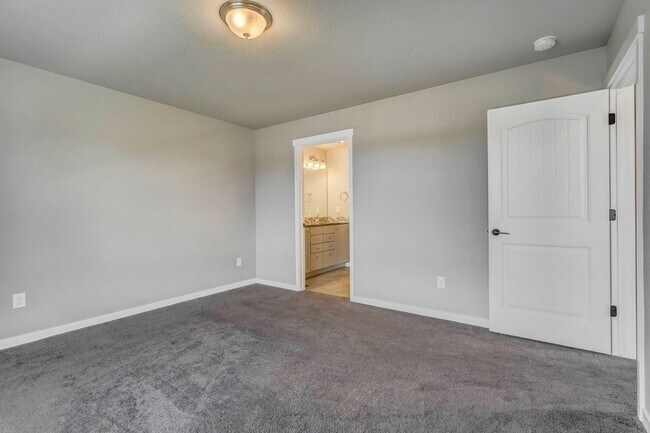 Building Photo - Modern 4BR with Open Kitchen, Patio & 2-Car Garage