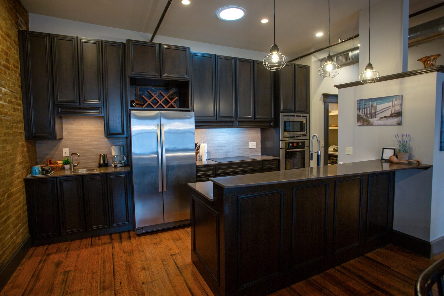 Induction cooktop to R of refrigerator - 225 E Blaine Ln
