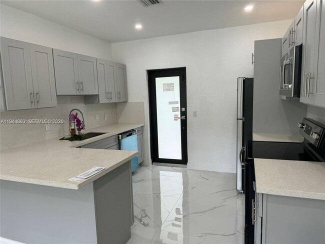 Building Photo - 1210 NW 123rd St