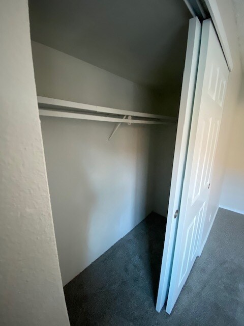 Spacious closet with storage above - 7755 E Quincy Ave