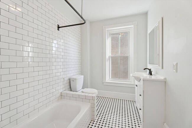 Building Photo - Stylish Phoenixville Rowhome with Exposed Brick, High Ceilings & Central Air
