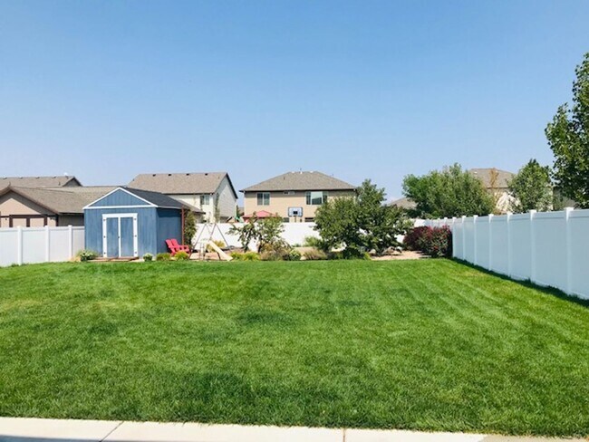 Building Photo - Beautiful home in North Salt Lake with large patio, deck and garden area