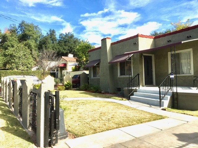 Front of house with electric gate - 1968 El Molino Ave