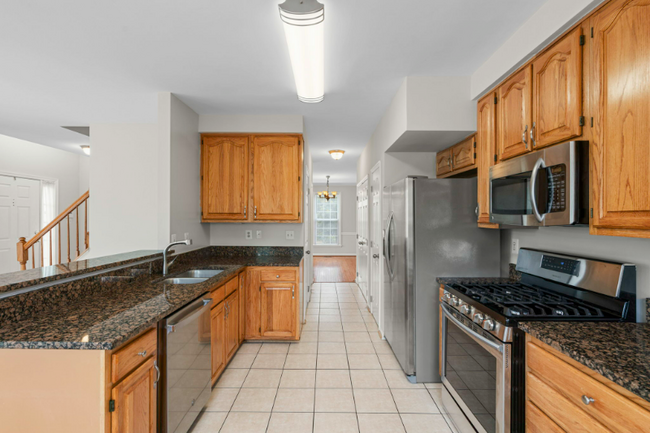Building Photo - 7073 Kings Manor Dr