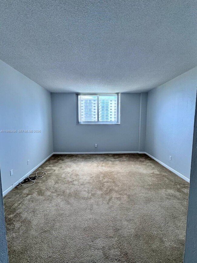 Building Photo - 19380 Collins Ave