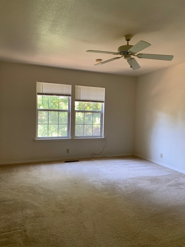 Building Photo - Spacious 3-Bedroom Home with Greenbelt Views & Landscaping Included