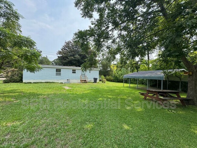 Building Photo - 1227 Village Rd NE