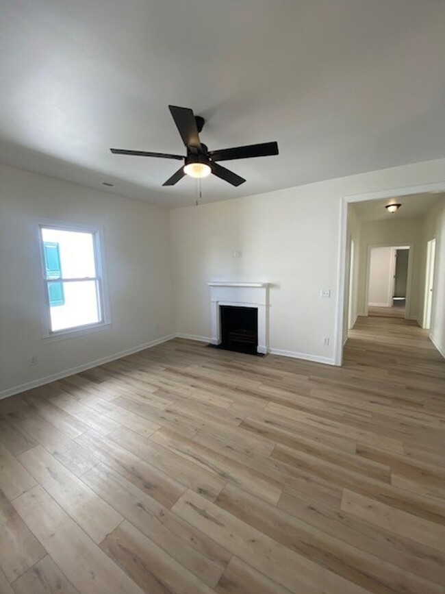 Building Photo - Welcome to this newly remodeled 4-bedroom,...