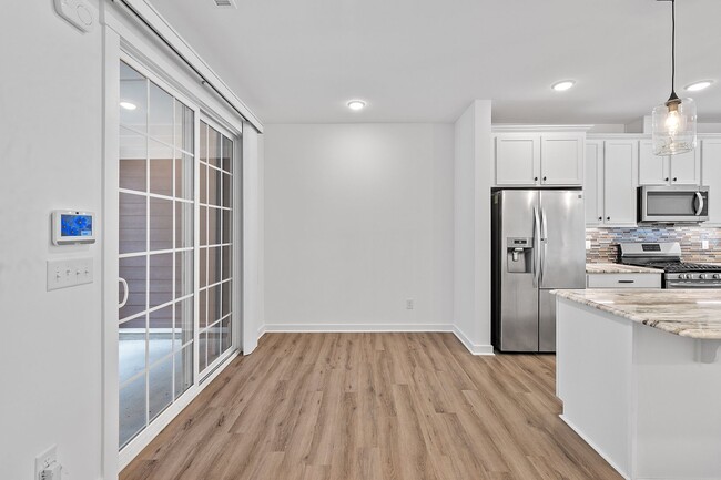 Building Photo - 3 Bedroom Townhome with Rooftop Terrace in Downtown Wake Forest!