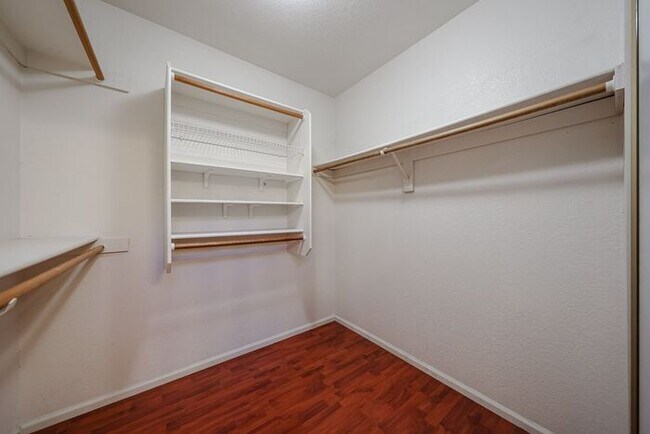 Building Photo - Welcome to this stunning 4-bedroom, 2-bath...