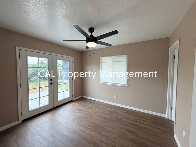 Building Photo - Spacious 4-Bedroom Home with 2-Car Garage & Backyard Oasis