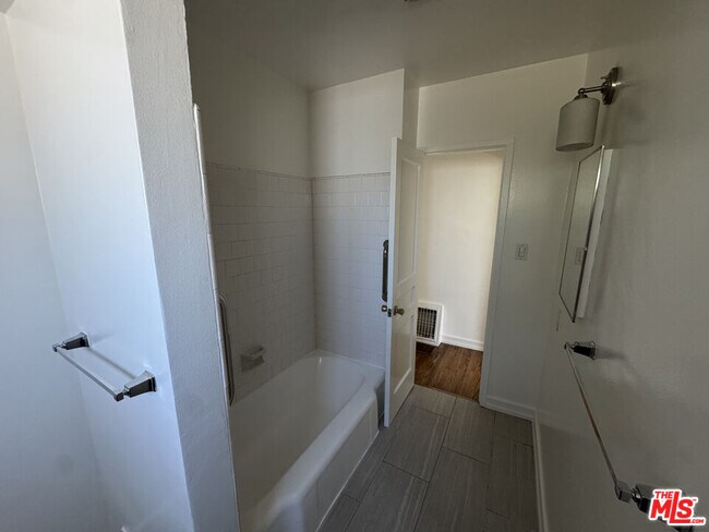 Building Photo - 6003 Bellflower Blvd