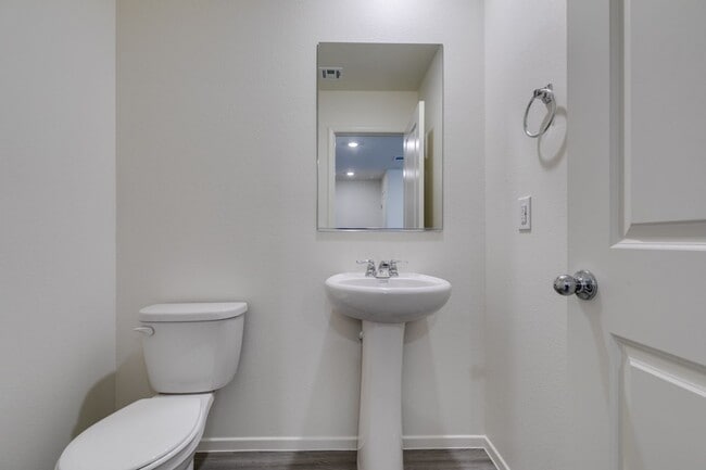 Building Photo - Gorgeous Townhome with upgrades in gated community* 3 large bedrooms, 2 car garage*Community pool...