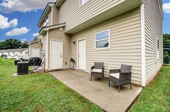 Building Photo - Your Dream Townhome is One of last 2 - Cla...