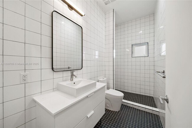 Building Photo - 3435 NW 9th Ct