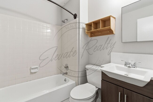 Building Photo - SPRING SPECIAL!! FIRST MONTH FREE on this Two Bedroom Condo, Garden Level with Washer/Dryer Hook ...