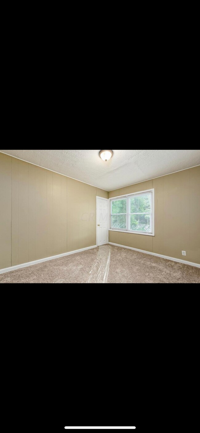 Building Photo - 1246 E 22nd Ave