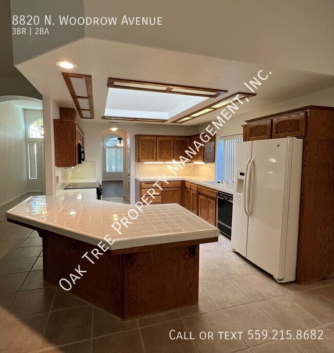 Building Photo - 8820 N Woodrow Ave