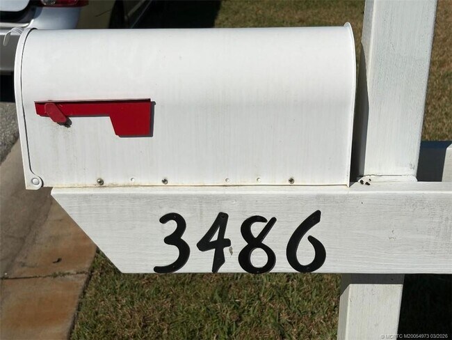 Building Photo - 3486 SW Pindo Palm Ln