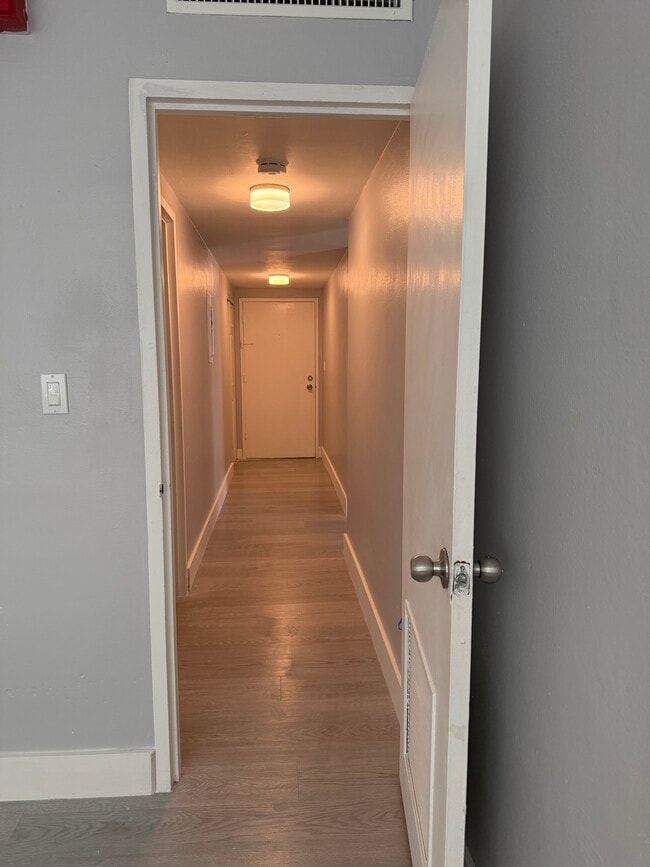 Hall way to front door - 1865 79th Street Cswy