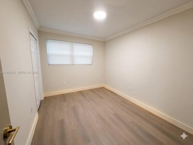 Building Photo - 6885 NW 14th Ct