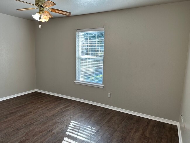 Building Photo - Clean, updated home on a corner lot with privacy fence and storage shed.