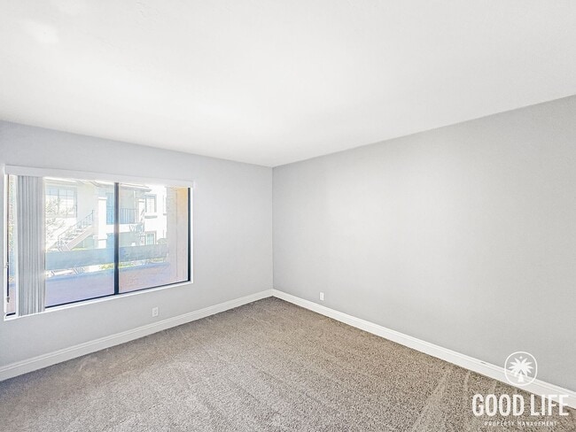 Building Photo - Light-Filled 2BD/2BA Top-Floor Condo in Mira Mesa with Granite Kitchen, Private Balcony & Pool