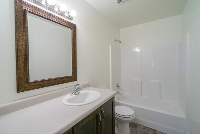 Building Photo - Modern 4-Bed Stand-Alone Home with Fenced Patio