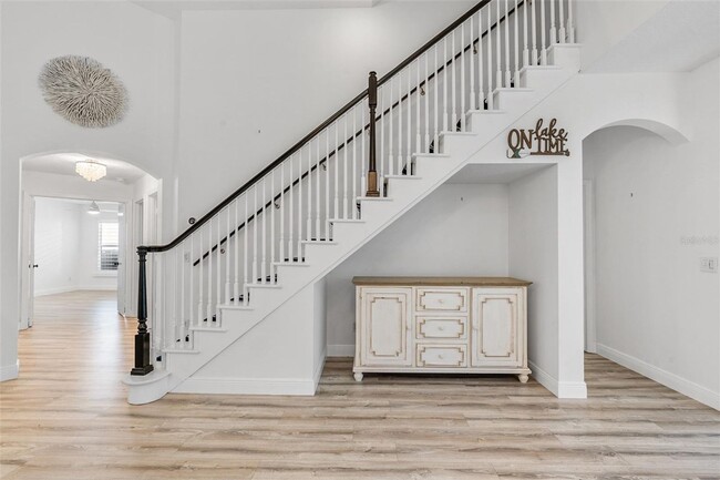Building Photo - Stunning Custom Rental in Gated 55+ Royal ...