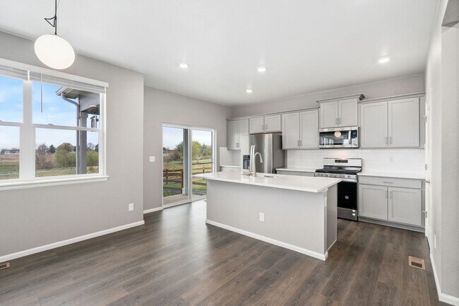 Building Photo - LOOK AND LEASE: MAY RENT FREE Spacious 4BD...
