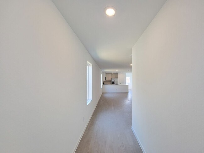 Building Photo - This single-story home shares an open layout between the kitchen, nook and family room for easy e...