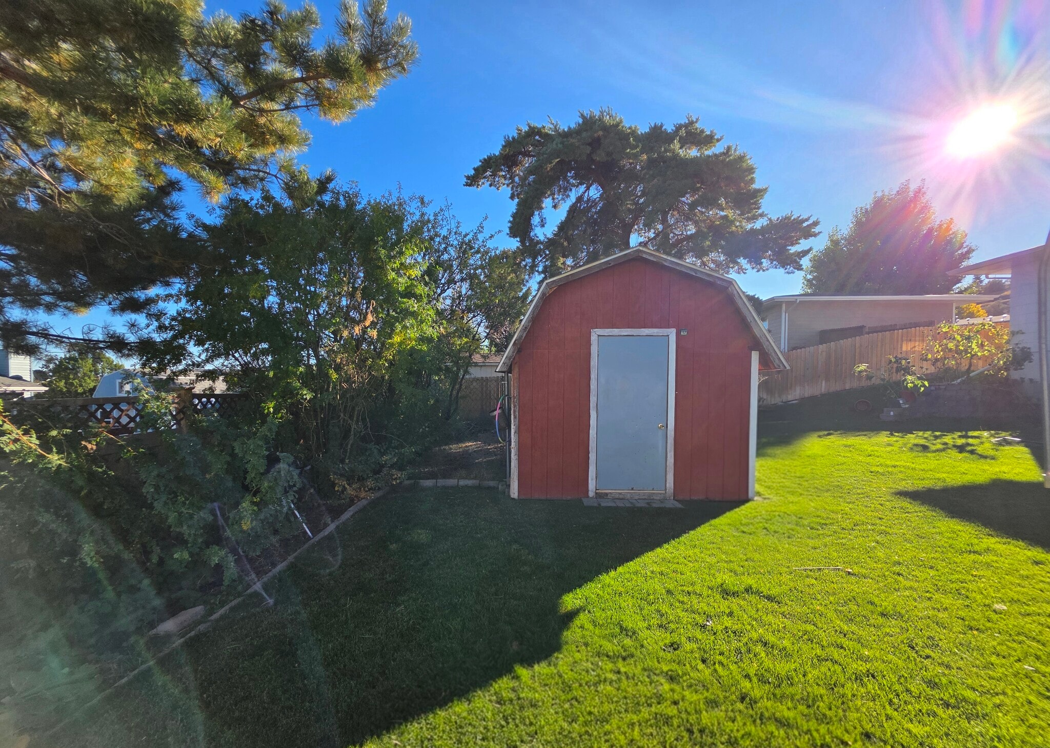 Backyard storage shed/dog run - 1409 2nd West Hill Dr