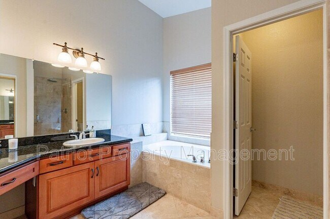 Building Photo - 9910 E Sutton Dr